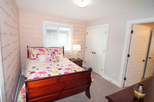 237 Kinniburgh Way, Chestermere, AB - Indoor Photo Showing Bedroom