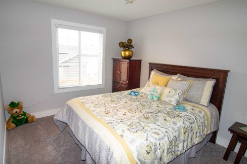 237 Kinniburgh Way, Chestermere, AB - Indoor Photo Showing Bedroom