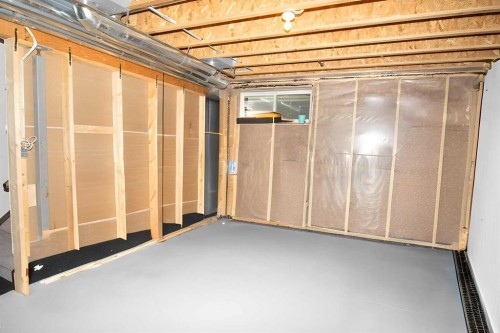 237 Kinniburgh Way, Chestermere, AB - Indoor Photo Showing Basement