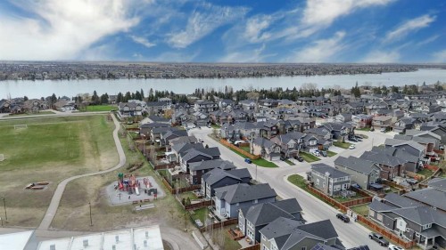 237 Kinniburgh Way, Chestermere, AB - Outdoor With Body Of Water With View