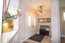 237 Kinniburgh Way, Chestermere, AB  - Indoor Photo Showing Other Room 