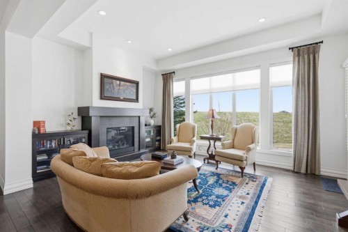 117 Spring Water Close, Heritage Pointe, AB - Indoor Photo Showing Living Room With Fireplace