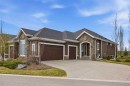 117 Spring Water Close, Heritage Pointe, AB  - Outdoor With Facade 