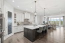 117 Spring Water Close, Heritage Pointe, AB  - Indoor Photo Showing Kitchen With Upgraded Kitchen 