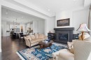 117 Spring Water Close, Heritage Pointe, AB  - Indoor Photo Showing Living Room With Fireplace 