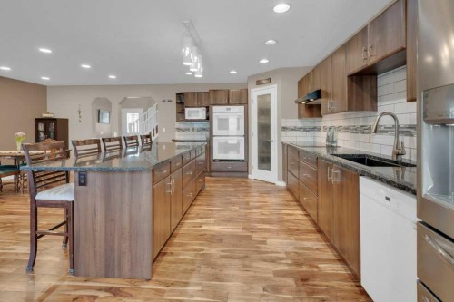 15 New Brighton Manor Se, Calgary, AB - Indoor Photo Showing Kitchen With Upgraded Kitchen