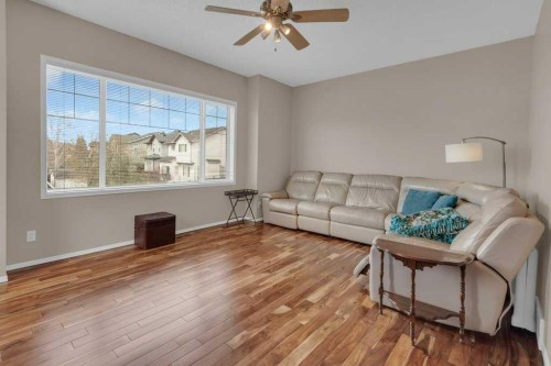 15 New Brighton Manor Se, Calgary, AB - Indoor Photo Showing Living Room