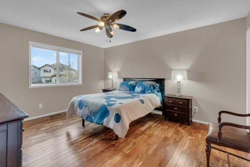 15 New Brighton Manor Se, Calgary, AB - Indoor Photo Showing Bedroom