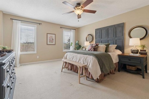 59 Heritage Cove, Heritage Pointe, AB - Indoor Photo Showing Bedroom