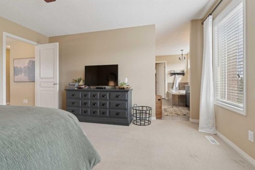 59 Heritage Cove, Heritage Pointe, AB - Indoor Photo Showing Bedroom