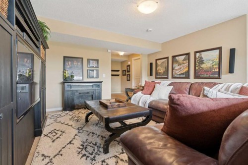 59 Heritage Cove, Heritage Pointe, AB - Indoor Photo Showing Living Room