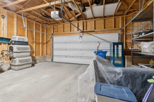 59 Heritage Cove, Heritage Pointe, AB - Indoor Photo Showing Garage