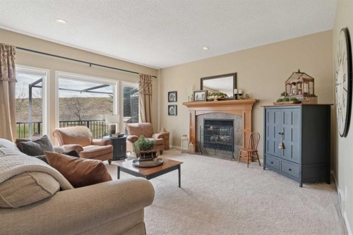 59 Heritage Cove, Heritage Pointe, AB - Indoor Photo Showing Living Room With Fireplace