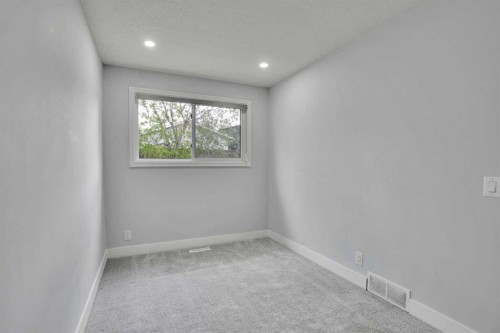 44 Falmead Road Ne, Calgary, AB - Indoor Photo Showing Other Room