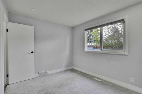 44 Falmead Road Ne, Calgary, AB - Indoor Photo Showing Other Room