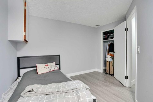 44 Falmead Road Ne, Calgary, AB - Indoor Photo Showing Bedroom