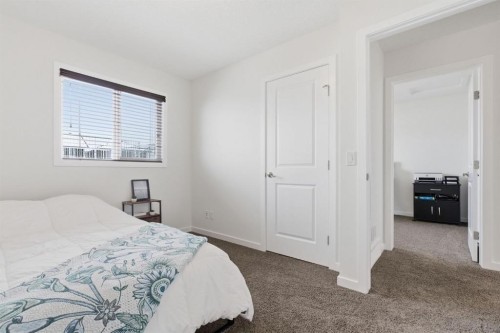 773 River Heights Crescent, Cochrane, AB - Indoor Photo Showing Bedroom