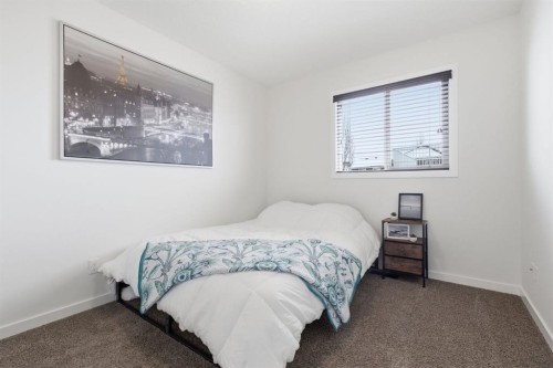 773 River Heights Crescent, Cochrane, AB - Indoor Photo Showing Bedroom