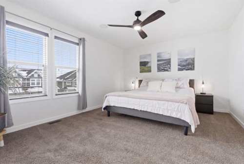 773 River Heights Crescent, Cochrane, AB - Indoor Photo Showing Bedroom