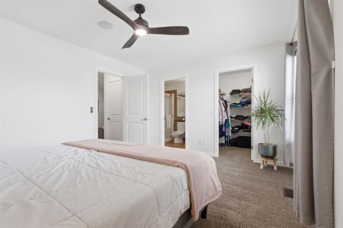 773 River Heights Crescent, Cochrane, AB - Indoor Photo Showing Bedroom