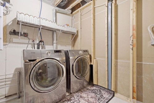 773 River Heights Crescent, Cochrane, AB - Indoor Photo Showing Laundry Room