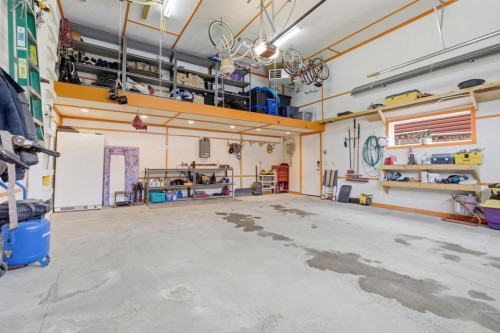 773 River Heights Crescent, Cochrane, AB - Indoor Photo Showing Garage