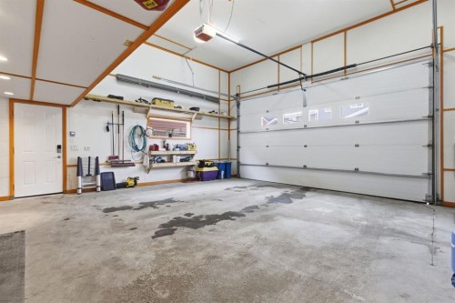 773 River Heights Crescent, Cochrane, AB - Indoor Photo Showing Garage