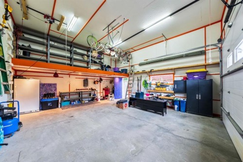 773 River Heights Crescent, Cochrane, AB - Indoor Photo Showing Garage