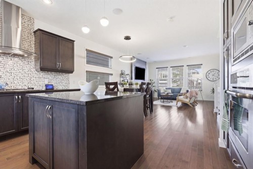 773 River Heights Crescent, Cochrane, AB - Indoor Photo Showing Kitchen With Upgraded Kitchen