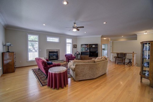 224 52 Avenue West, Claresholm, AB - Indoor Photo Showing Living Room With Fireplace