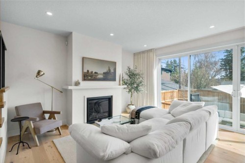 2853 14 Avenue Sw, Calgary, AB - Indoor Photo Showing Living Room With Fireplace