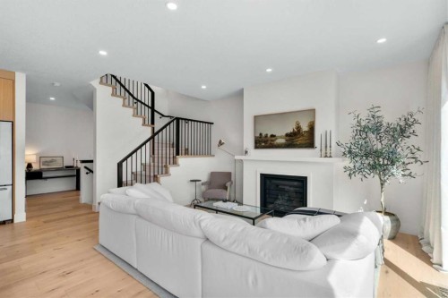 2853 14 Avenue Sw, Calgary, AB - Indoor Photo Showing Living Room With Fireplace