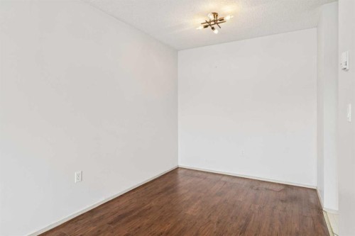 418-10 Dover Point Se, Calgary, AB - Indoor Photo Showing Kitchen With Double Sink
