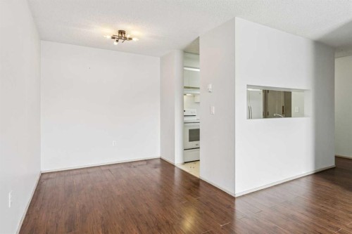 418-10 Dover Point Se, Calgary, AB - Indoor Photo Showing Kitchen With Double Sink