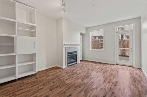 206-3651 Marda Link Sw, Calgary, AB - Indoor With Fireplace