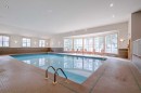 206-3651 Marda Link Sw, Calgary, AB  - Indoor Photo Showing Other Room With In Ground Pool 
