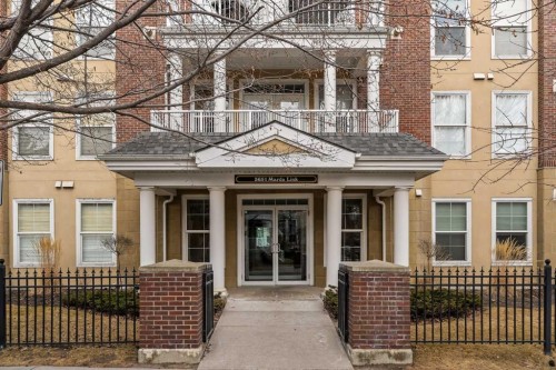 206-3651 Marda Link Sw, Calgary, AB - Outdoor With Balcony With Facade