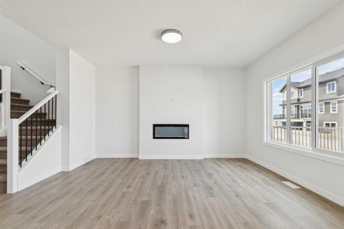 10 Quartz Gate, Balzac, AB - Indoor Photo Showing Bedroom