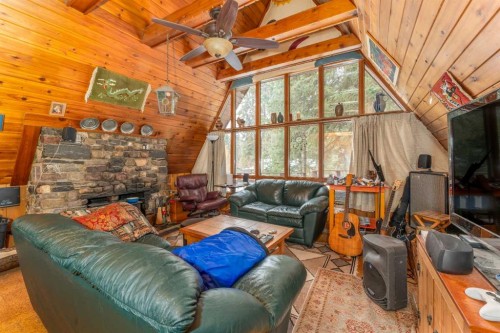 77 Grotto Road, Harvie Heights, AB - Indoor Photo Showing Other Room With Fireplace