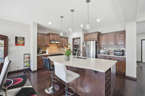 233 Aspenmere Circle, Chestermere, AB - Indoor Photo Showing Kitchen With Upgraded Kitchen