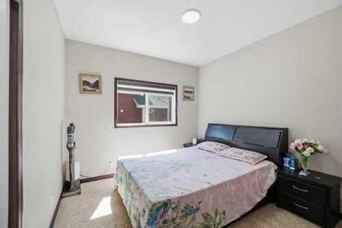 233 Aspenmere Circle, Chestermere, AB - Indoor Photo Showing Bedroom