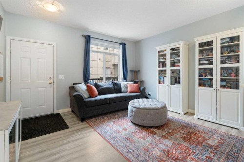 210-5703 5 Street Sw, Calgary, AB - Indoor Photo Showing Living Room
