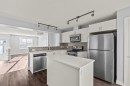 4 Evanscrest Gardens Nw, Calgary, AB  - Indoor Photo Showing Kitchen With Stainless Steel Kitchen With Upgraded Kitchen 