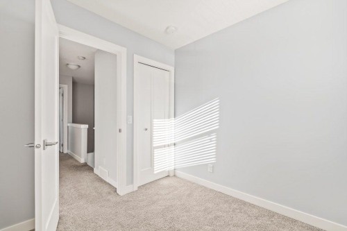 4 Evanscrest Gardens Nw, Calgary, AB - Indoor Photo Showing Other Room