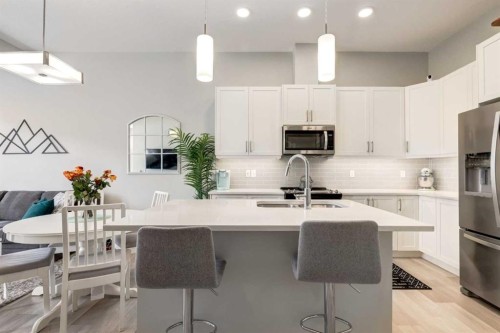 212 Crestbrook Common Sw, Calgary, AB - Indoor Photo Showing Kitchen With Stainless Steel Kitchen With Upgraded Kitchen