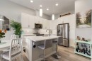 212 Crestbrook Common Sw, Calgary, AB  - Indoor Photo Showing Kitchen With Stainless Steel Kitchen With Upgraded Kitchen 