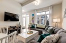 212 Crestbrook Common Sw, Calgary, AB  - Indoor Photo Showing Living Room 