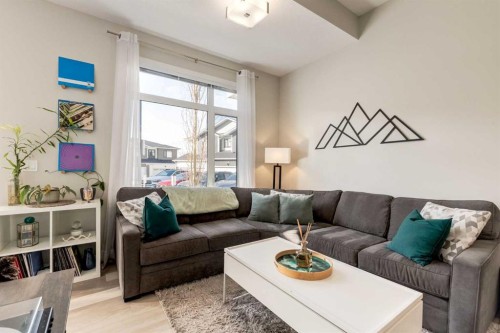 212 Crestbrook Common Sw, Calgary, AB - Indoor Photo Showing Living Room