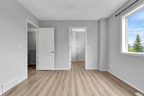 164 Bridleridge Gardens Sw, Calgary, AB - Indoor Photo Showing Other Room