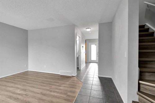164 Bridleridge Gardens Sw, Calgary, AB - Indoor Photo Showing Other Room